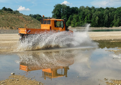 Wasser-Action Bild mit dem Unimog